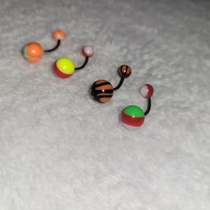 4 piece orange/striped belly button rings